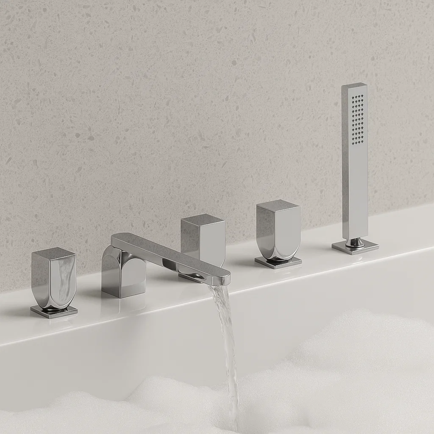 Chrome bathroom faucet set with handheld shower on a white surface.