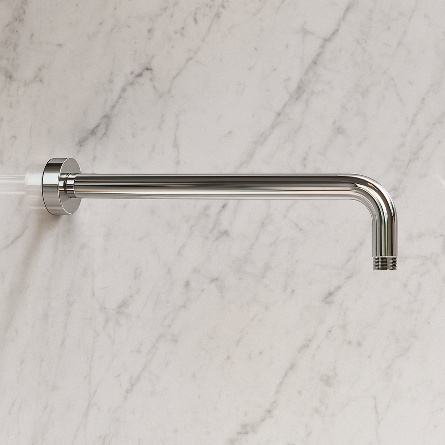 Metal shower head on a marble wall