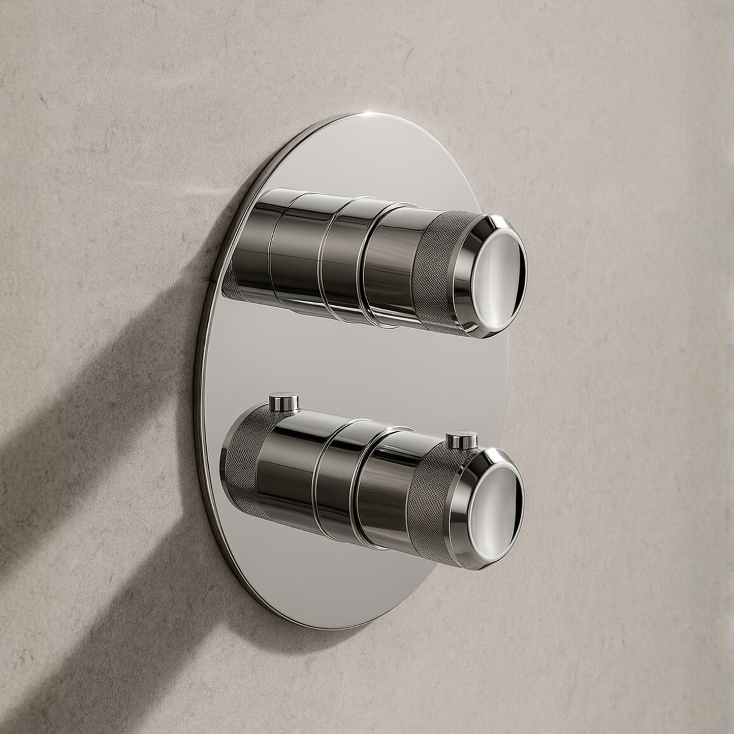 Chrome wall-mounted control valve on a beige wall