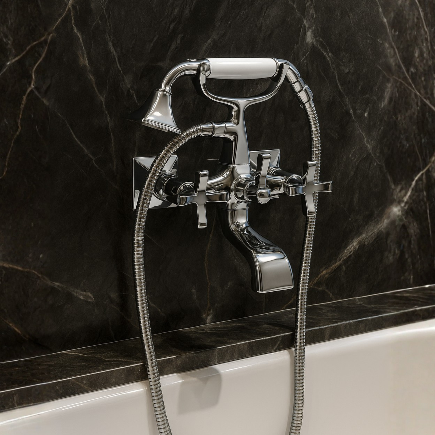 Chrome bathtub faucet with handheld shower head against a black marble wall.