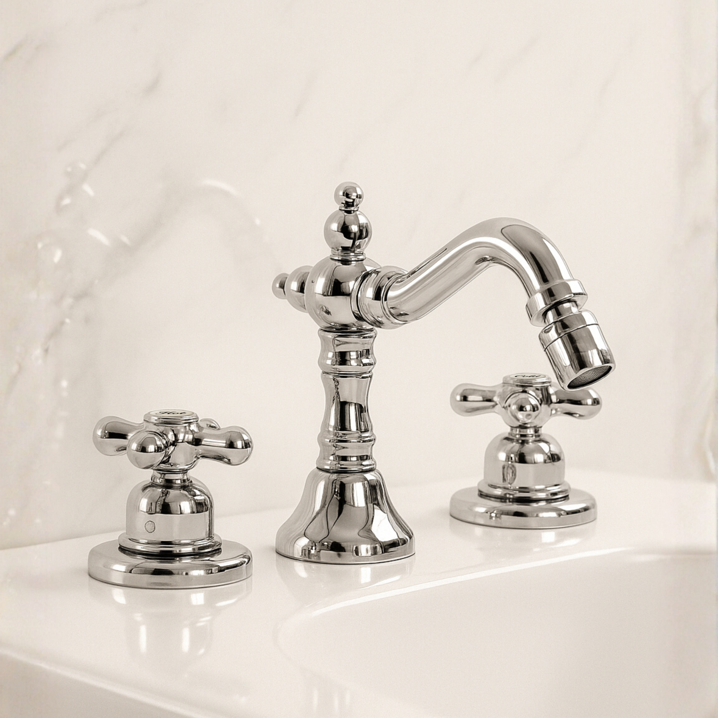 Chrome bathroom faucet set on a white countertop with a neutral background