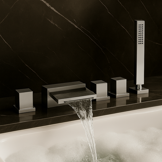 Modern bathroom faucet set with water flowing into a bathtub against a black marble wall.