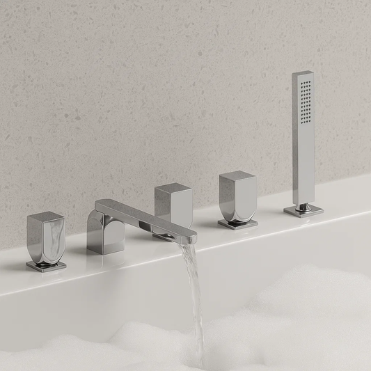Chrome bathroom faucet set with handheld shower on a white surface.