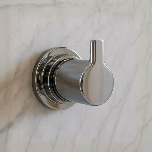 Chrome robe hook on a marble wall