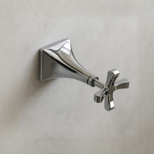Chrome wall-mounted shower head on a light gray background