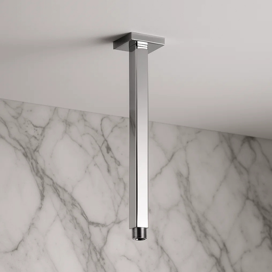Chrome ceiling-mounted shower head on a marble wall background