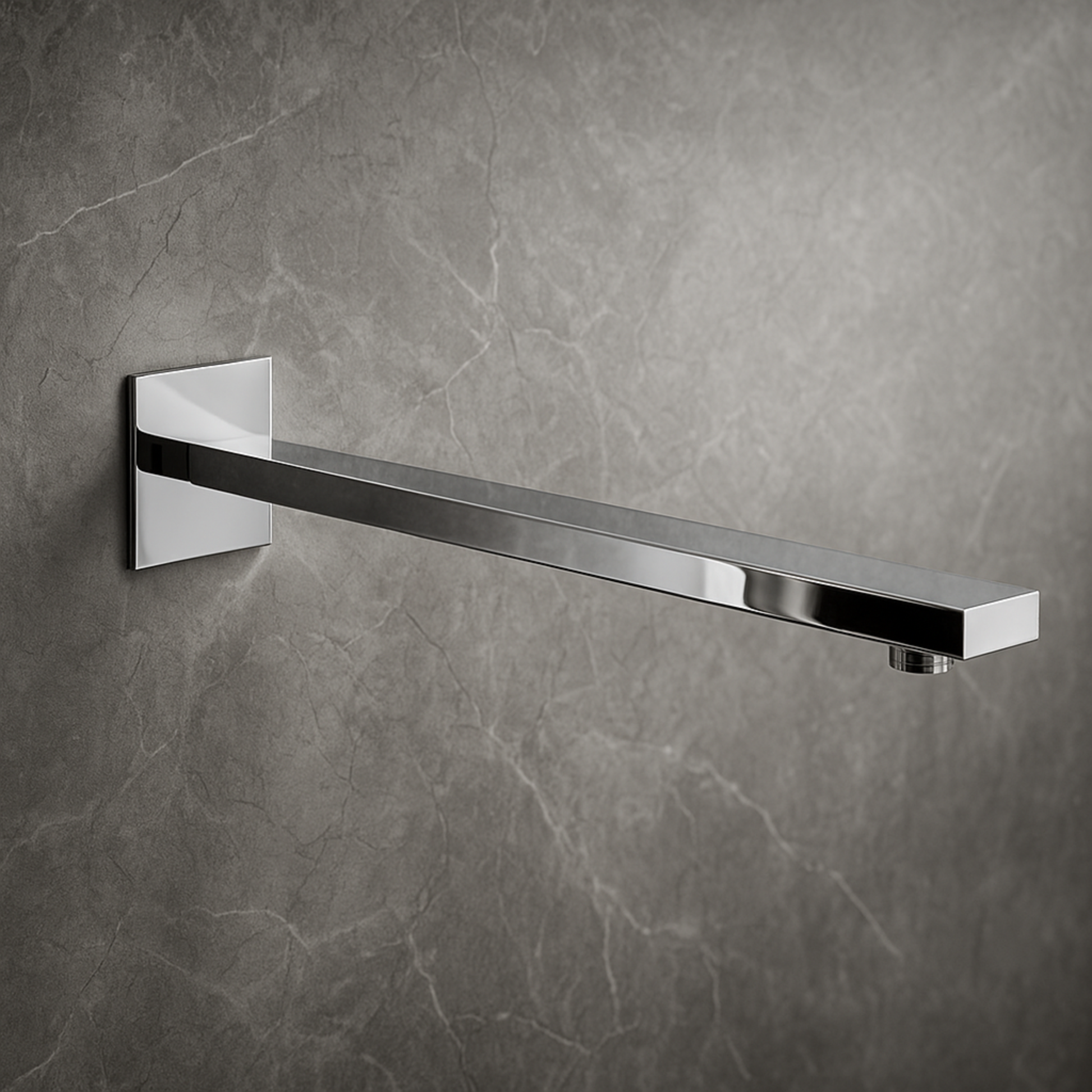 Chrome towel bar mounted on a gray tiled wall