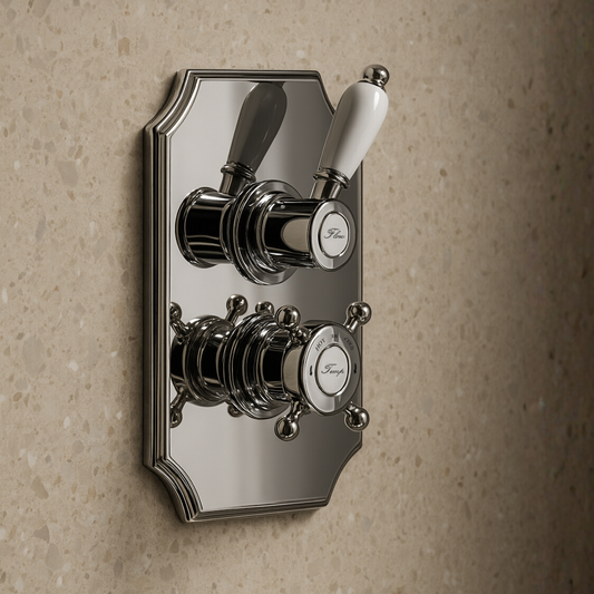 Chrome bathroom valve control with white handle on a beige wall